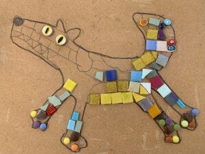 colourful mosaic of dog under construction